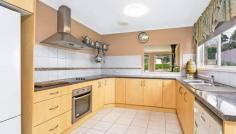  3 Lackenwood Cres Galston NSW 2159 $1,149,000 OPEN HOME : SATURDAY 10:30 to 11:00AM SERENE AND SPACIOUS SINGLE LEVEL ON 963m2 Located in a quiet street with a private outlook to the rear this large family home offers fantastic spaces both inside and out to enjoy. An ideal property for those who are looking for space, privacy and convenience. - Light filled formal lounge and dining room - Renovated kitchen with plenty of cupboard and bench space adjoining meals area - Master bedroom with ensuite and walk in robe - All other bedrooms include built in cupboards - Spacious rumpus which enjoys the serene setting and flows to the outside - Inviting and private timber entertaining deck - Low maintenance child and pet friendly backyard  Conveniently positioned within easy access to Galston village, Galston Club, Galston High School and Public School. Within 12km to Hornsby and Berowra Waters and also within 15km to Castle Hill, this property offers city convenience with the Galston Village lifestyle. FACT SHEET Accommodation - 5 bedrooms, master with large walk in robe and ensuite - All other bedrooms have built in cupboards - Light filled lounge & dining room with combustion fireplace - Large rumpus room with easy access to outside entertaining area - Renovated kitchen with plenty of storage and adjoining meals area Grounds and Garaging - North facing rear yard - Timber entertaining deck - Side access - Double carport - Garden shed - Under house storage - Fully fenced child and pet friendly yard Location - Situated in a peaceful street, close proximity to Galston Village, Medical Centre and the Galston Club - Easy access to Galston high school and public school - A great neighbourhood which maintains a wonderful village atmosphere   Property Snapshot  Property Type: ResidentialHouse Features: Air-Conditioning Built-In-Robes Close to Schools Close to Transport Deck Dining Room Dishwasher Ensuite Established Gardens Fully Fenced Yard Garden Shed Landscaped Gardens Northerly Aspect Pergola Renovated Kitchen Rumpus Room Side Access Storage Study Walk-In-Robe 