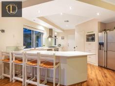  15 Sweep Ridge Yanchep WA 6035 $629,000 + 	 A Beach style outlook and a welcoming decked portico, allows one to enjoy the fabulous sunset from your porch with a cuppa this is just the start to this spectacular family home.  This 4 bedroom, 2 bathroom, plus study / 5th bedroom family home will exceed your expectations Supersized, with 292.6sqm home on a 677sqm block and a well throughout floor plan that has been finished to accommodate a big family in mind.  This family home will impress as soon as you enter with it's beautiful floors throughout giving this home warmth & ambience. Huge master bedroom features ensuite with his and hers basin, huge shower, separate w/c and wall to wall walk-in-robe is fantastic.  Also Offering multiple living areas, theatre room, designer kitchen with ceasarstone bench tops, stunning outdoor swimming pool with a 4 seater spa and pitched patio a must see, much more on offer too much to mention............. Features:  *Ocean Views / Glimpse from master bedroom and Portico *Massive 292.6sqm total space *4 bedrooms, plus study, plus home theatre *Master bedroom with large walk-in-robe, ensuite with his and hers basin, shower and separate WC  *Massive living area with ornamental fire place  *Designer kitchen with Caesar stone bench tops, dishwasher, 900mm gas cooktop, oven, breakfast bar, loads of cupboards and huge pantry *Theatre room *3 king sized bedrooms with double BIR an Features Deck Spa Smoke Alarms   	 In-ground pool Undercover outdoor area RCDs Property Details Bedrooms 		 4 Bathrooms 		 2 Garages 		 2 Land Area 		 677 m2 Floor Area 		 292 m2 