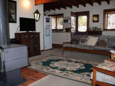  22 Hoyer St Cobargo NSW 2550 $269,000 COTTAGE CHARM L5698. Immaculately presented, this charming and cosy 2 bedroom cottage will absolutely delight you.  Living areas are warm and inviting, with slow combustion wood heating in the lounge, as well as the options of gas heating and RCAC. The kitchen is neat and super practical and the separate dining could easily become a 3rd bedroom if required.  The main bedroom is light with a lovely outlook, features built in robes and adjoins the modern 2 way bathroom.  The upstairs loft style bedroom is very spacious and could accommodate a parent's retreat or be a delightful room for a few children.  Set on a large level block amongst beautiful cottage gardens at the front and large park like setting at the rear.  A very special home that will be a joy to live in.   Property Snapshot  Property Type: House 