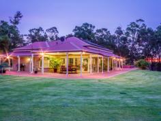  154 Douglas Rd Martin WA 6110 $979,000 Enter through the gates of this 5 acre(approx.) property and you will know you have found your slice of heaven!  Immaculately presented 4 Bedroom 2 Bathroom home+ powder room constructed in 2008.  Chef's country kitchen & breakfast bar, massive family/dining room, formal lounge, two entertainment area's and is surrounded by verandahs.  This property also boasts reverse cycle daikin a/c, electric roller shutters to windows and a wood heater for the chilly nights.  This home also has wonderful eco-friendly features such as:-  3.5k Solar System on 40c feed in tariff till 2018.  Extensive reticulated raised vegetable garden beds & aquaponics system for fish production.  A well established orchard.  All fed from crystal clear all year round spring water bore.  Fantastically big 14x10m serious workshop with 3 phase power  Two highline rain water tanks with over 500kl of combined storage and the most beautiful sunsets that money just cannot buy!! kangaroos, beautiful birds.........peace and tranquillity.......you just have to come and see....  To view call Peter Carroll on 0411 602 944 Energy Efficiency Rating: 3.5-star NABERS Energy Rating Features General Features Property Type: House Bedrooms: 4 Bathrooms: 2 Land Size: 2.00ha (4.94 acres) (approx) Indoor Ensuite: 2 Living Areas: 2 Toilets: 3 Workshop Built in Wardrobes Reverse cycle Air Conditioning Air Conditioning Outdoor Remote Garage Garage Spaces: 2 Outdoor Entertaining Area Eco-friendly Solar Panels Water Tank 