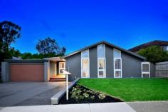  28 Elmstead Dr Wheelers Hill VIC 3150 Contemporary Style in a Parkside Location The stylish paintwork, white shutters and clean design lines of the facade of this residence give it a distinctive contemporary edge that is echoed in the fully renovated interior. Even the decorative front door has a unique quality. Inside, you are immediately struck by the openness, natural light, space and modernity. Attractive timber floorboards flow throughout, and the bright neutral decor is the perfect foil for decorative items. Off the entrance hall the lounge room (split-system A/C) has built-in cabinetry and an exposed brick feature wall with dual archways into the large family room which has an open study area with long built-in desk and cabinets. A brilliant kitchen is part of the room. It has stainless steel appliances, twin ovens, stone benchtops, copious soft-close drawers, and glass splashbacks. Doors open out to a plus-size covered wraparound deck that is great for the kids to play, BBQs, alfresco entertaining or relaxing in a private area overlooking the garden and the bush-like parkland behind the property. The home has 3 bedrooms - 2 with mirror-fronted built-in wardrobes and a desk; the master bedroom with fitted walk-in wardrobe and an ensuite - plus a fully tiled family bathroom and a powder room. There is also a bonus room (with split-system A/C) that could be a play room, media room, home theatre, games room or even a 4th bedroom. The property also comes with ducted heating and cooling, garage with automatic door, and shed. On an allotment of approx 650sqm, this desirable home earns bonus credits for its location backing onto Dandenong Valley Parklands, near Jells Park, Caulfield Grammar and other schools, local and major shopping centres, EastLink Trail for walkers, runners and cyclists, Monash University, Monash freeway and EastLink. Price Guide: Contact Agent   |  Land: 650 sqm approx 	  |  Type: House  |  ID #534011 