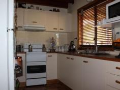  22 Hoyer St Cobargo NSW 2550 $269,000 COTTAGE CHARM L5698. Immaculately presented, this charming and cosy 2 bedroom cottage will absolutely delight you.  Living areas are warm and inviting, with slow combustion wood heating in the lounge, as well as the options of gas heating and RCAC. The kitchen is neat and super practical and the separate dining could easily become a 3rd bedroom if required.  The main bedroom is light with a lovely outlook, features built in robes and adjoins the modern 2 way bathroom.  The upstairs loft style bedroom is very spacious and could accommodate a parent's retreat or be a delightful room for a few children.  Set on a large level block amongst beautiful cottage gardens at the front and large park like setting at the rear.  A very special home that will be a joy to live in.   Property Snapshot  Property Type: House 