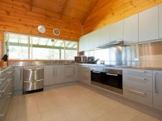  9 Voss Pl Mitchells Island NSW 2430 $519,000 SCENIC RETREAT Located on the picturesque Mitchells Island and only a short 15 minute drive from the conveniences of Old Bar Beach, you will find this spacious home which has a lot to offer. A rural feel without the rural maintenance, this 1.245 hectare property has pleasant views of mountain ranges and even a few river glimpses.  * Generous four bedroom home * High pitched ceilings in the large open living area * State of the art kitchen with double oven, stainless steel benchtops and dishwasher * Two bathrooms, one servicing second and third bedrooms much like an ensuite * Generous timber deck with great views * Additional loft and storage spaces at both ends of the house * Triple carport plus colorbond garage with workshop * 4.5 Kilowatt solar system (save on power) * Town water plus tanks * 15 minutes drive to beaches and shopping Living the dream has never been easier, simply call Adam Stevenson on 0409 607 967.   Property Snapshot  Property Type: House on acres Construction: Hardiplank Land Area: 1.24 ha Features: Built-In-Robes Decking Dishwasher Outdoor Living Renovated Spa Storage Undercover Entertainment Area Verandah Walk-In-Robes Workshop Yard 