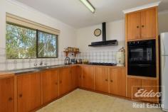  21 Brand Ave Victor Harbor SA 5211 $365,500 Brand New Beginnings - Ocean Views. Solid brick family home in central Victor Harbor. Large allotment with landscaped gardens and picturesque coastal views!* 3 double bedrooms, main with BIR's. Timber kitchen with walk in pantry, ample bench/cupboard space with ocean views. Sunlit, spacious upgraded bathroom with bath and seperate shower. Large laundry with storage. x 2 w/c's. Sun room/casual living on entry. Large living and formal dining area, split system r/c a/c, c/fan with coastal views*. Downstairs large spacious area with access door to rear and double remote roller doors to front with x 3 carports. Fantastic option for games room/ rumpus room or potential for self contained unit (STCC). Solar panels x 10 plus 8,000 litre rain water tank storage. Garden shed + shade house. Drive through to rear powered 8m x 6m double bay garage + workshop. UMR paved entertaining area overlooking landscaped gardens... blissful. Short distance to CBD, foreshore, schools and major shopping. With interest rates on hold, opportunity is open to purchase prime holding in central Victor.  Land Area approx 1054sqm block. Other features: Built-In Wardrobes,Close to Schools,Close to Shops,Close to Transport,Garden,Ocean views Property Details Elders Property ID: 8781228 3 bedrooms 1 bathrooms 7 car parks Land Area 1045 square metres Car Parks: 1 3 car garage 3 car carport Air Conditioning Related Elders Services Elders Home Loans Loan Calculator | 1300 LENDING Elders Insurance Request a Quote | 13 LOCAL 