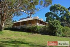  200 Coombes Rd Kronkup WA 6330 $895,000 Stone Manor with Ocean Views in Incredible Lifestyle Destination - 	 Magnificent stone home on five acre lifestyle block  - 	 Spectacular setting on undulating block dotted with beautiful Karri, with views to Tor Bay - 	 Wide wrap-around verandahs, stunning internal timbers & plasterwork - 	 Amazing sun filled country kitchen-dining room with vaulted ceiling - 	 Separate formal lounge and formal dining - 	 Glorious modern lounge/family room with terrific outlook - 	 Large bedrooms downstairs, additional huge master upstairs with spa overlooking ocean - 	 Character family bathroom with claw-foot bath - 	 Large stone-construction double carport, 9m x 8m shed, stone woodshed/stable, and double stable with store room - 	 Bore with potable water, ample rainwater supply  - 	 Amazing lifestyle destination, previous use as B&B It is obvious even before entering, so much love and consideration went into the original design, build and positioning of this gracious country homestead. And it is only fitting that the property and region chosen to create this distinctive home should be just as inspiring and beautiful. The home is set high on picturesque Torbay Hill in a small, friendly coastal community near Albany. It cleverly reflects the elegance and classic craftsmanship of a bygone era. What a glorious place to run a few horses, offer B&B accommodation handy to marvelous scenery and outdoor activities, or just sit in a rocking chair with wine and book in hand and relish the country experience. The sprawling home features a gracious, flexible downstairs floor plan including wide corridors, timber floors and dados, three elegant, light-filled living areas and spacious country kitchen, separate dining room, large bedrooms, vaulted and high ceilings, open fireplace and heritage bathroom with claw foot bath. Upstairs reveals a glorious master bedroom with ensuite spa bath overlooking the ocean. The block itself is absolutely stunning with good pasture dotted with inspiring Karri trees. Perfect for a few stock or just for a bit of space, the property also boasts a great 9m by 8m colourbond shed, separate stables with store room, and stone shed that would also  work as a stable. Property Details Elders Property ID: 9726327 4 bedrooms 2 bathrooms 4 car parks Land Area 2.083 hectares Double garage Double carport 