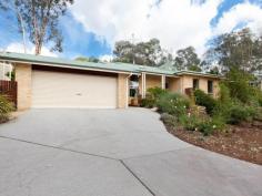  18 Temora Place Queanbeyan NSW 2620 $799,000 Architecturally Designed Solar Orientated Masterpiece Versatile family home with space and privacy for all well situated on a gently sloping block of 2313sqm (approx.). This split-level architecturally designed solar orientated home which is big on space and big on value will suit families or couples looking for a relaxed and tranquil lifestyle. The house interacts with its surroundings through views from all windows, quiet places for escaping the demands of work and family life as you sit on the terrace areas, enjoy sweeping views of the surrounding area and afternoon breezes With room to accommodate large families, it boasts five bedrooms, three bathrooms and multiple living zones. These combine perfectly with the well laid out gardens that take in different views, trees and elements of the surrounds not to mention entertaining options that even include a pool. Noteworthy features include: Family size kitchen Fantastic outdoor area encompassing manicured gardens, 3 rain water tanks Utility area with garden shed Pool area Solar oriented Garden views from every window Country style retreat with modern living Separate studio Large Master bedroom, sunken bath with garden views, access to terrace Guest powder room/bathroom Roof storage The architecturally designed house was not only designed to take full advantage of the solar passive elements but also full usage of the 2313sqm of land. The owners have spent many years planning and creating wonderful gardens to take full advantage of this including having the gardens are serviced by 3 rain water tanks giving 50 thousand litres for garden use. The gardens have themes and are the wild garden, 'National Park', 'flower garden', 'vegetable garden', and 'kitchen garden'. You can add to this a great utility area complete with its own garden shed. These gardens are complimented or even enhanced through the pool area, paved entertaining areas, parents courtyard retreat, established fruit trees and even rear access to Mount Jerrabomberra walking trails. Ideally located in a quiet sort after family orientated area it is within 20 minutes of Woden, Tuggeranong and Civic with easy access to the south coast and Sydney. It is easily one of the quietest places in the region. This is a unique opportunity to purchase a great lifestyle moments from everything - be quick toinspect! Inspections: Open Homes Or by Appointment Details: Call Jason Maxwell on 0416 182 379 or email jmaxwell.queanbeyan@ljh.com.au   Property Snapshot  Property Type: House Land Area: 2,313 m2 Features: Ensuite Dishwasher 
