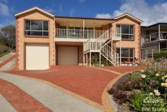  13 Laurie Ave Encounter Bay SA 5211 $565,000 Let me see forever but I ask you please - Don't fence me in. Laurie Avenue is set proudly on high, overlooking a spectacular vista of the Victor Harbor Township, rolling hills and the panorama of sea and Islands of Encounter Bay. Despite its location it is surprisingly protected and an oasis for anyone seeking to downsize yet not be hemmed in. Comprising – • 	 Upstairs – 3 spacious bedrooms, master fit for a king – or two joined king singles in this case – complete with views, en suite and walk in robe • 	 Warm and welcoming central open plan living with floor to ceiling picture windows and views • 	 Solid oak kitchen with adjacent meals area, both with views • 	 Bedrooms 2 & 3 with built in robes and serviced by the delightfully decorated main 3 way bathroom with dual vanity powder room and spa • 	 Large laundry with linen and broom cupboard and direct access to single carport at rear • 	 Downstairs – Granny flat, open plan with en suite and kitchenette – extra bedroom easily added. • 	 3 bay garage comprising high clearance caravan bay with panel lift door, car garage with panel lift door and workshop bay with window to views and 3 phase power. • 	 Sweeping concrete driveway – but don’t be deterred as our current vendors back a huge caravan up it and there are several spots to turn around so you can drive out forwards. Steps at the front of the home are optional as you can come straight into the top level from the back of the home. • 	 Nicely landscaped with low maintenance, easy care gardens • 	 22,000 litre rainwater tank – into the home • 	 Ducted reverse cycle heating and cooling AND vacuuming! This is what you get when you take a farming couple off of the land and down size them. Only a few minutes to the centre of town and all Victor Harbor has to offer all manner of age groups. Don’t pass this quality built home by if you are after something a little bit special. Other features: Built-In Wardrobes,Garden,Secure Parking,Formal Lounge,Separate Dining,Terrace/Balcony Property Details Elders Property ID: 9233038 4 bedrooms 3 bathrooms 7 car parks Land Area 859 square metres Car Parks: 4 Double garage Single carport Air Conditioning Related Elders Services Elders Home Loans Loan Calculator | 1300 LENDING Elders Insurance Request a Quote | 13 LOCAL 