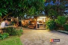  15 Helga Ave Padstow NSW 2211 This single level family home is in great condition and has the flexibility for you to move straight in, update or potentially re develop (subject to council approval). The home is in an ideal location being in a quiet cul-de-sac and within close proximity to schools, shops & transport. - Four spacious bedrooms - Master with ensuite & split system a/c - Level & clear block - 1058sqm, 15.49m frontage - Formal lounge area with split system a/c - Galley style kitchen with walk-in pantry  - Original but neat main bathroom with tub - Covered BBQ & pergola entertaining areas  - Bonus separate large family room with a/c  - Drive through carport to a huge double lock up garage - Ample storage space or convert to teenage retreat  - Short distance to schools, shops & station   Property Snapshot  Property Type: House Land Area: 1,058 m2 