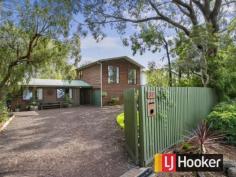  37 Florida Ave Inverloch VIC 3996 RETREAT ON THE RESERVE Enjoying an enviable position in one of Inverloch's most sought after leafy areas and with a nature reserve on two sides of the property, this hidden gem is suitable for all occasions whether it be for holiday or permanent living. Consisting of four bedrooms over two levels with two updated bathrooms, a living area on each level and totally updated kitchen with plenty of storage. Perfect for entertaining, the main living area opens onto a large decked balcony offering privacy whilst overlooking the rear garden and treed reserve, and a great place to sit and watch the spectacular sunsets! Climate control is managed through a split system in addition to solid fuel heating and energy bills are reduced with a 3KW solar system.  The property is fully fenced with plenty of room for off street parking for vehicles, boats and all your summer toys. The large lock up garage could even be used as an additional living space if required. You certainly get the feeling you are living amongst the trees within this hidden oasis, yet you are still only a few minutes' walk to the beach.   Property Snapshot  Property Type: House Construction: Timber Land Area: 870 m2 
