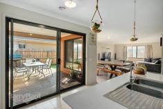  126 Warralily Boulevard Armstrong Creek VIC 3217 $429,000 - $459,000 Stylish & Spacious Family Home This contemporary family home perfectly combines spacious living with a relaxing coastal lifestyle. Situated on a 579m2 approx. allotment this home is close to walking tracks and playgrounds and is just a 15 minute drive to the Waurn Ponds Shopping Centre or Surf Coast. The front of this deceivingly large home offers drive way parking for two vehicles which lead to the large double remote garage with internal access. Upon entry you instantly have a sense of space and light as you are greeted by the wide open foyer with stunning tiled floor. From here you find a large functional study and the generous master bedroom with sitting area which is complimented by the large double walk-in robe and luxurious ensuite with double vanity, large shower and free standing bath tub. The wide, open hallway then leads to a comfortable living room or kids retreat. Further along you arrive at the heart of the home which is a well designed open plan space incorporating generous living, dining and stunning kitchen featuring stone bench tops, large walk-in pantry and quality stainless steel appliances including 900mm gas cook top/oven, range-hood and dishwasher. From here sliding doors then lead out to the large undercover and decked al fresco area, perfect for those who love to entertain outside all year round. Off the main living area and to the rear of the home are three great sized bedrooms all with built-in robes, a smart and stylish central bathroom with separate toilet and a functional laundry with an abundance of space and storage, and external access. With additional features such as gas central heating, solar panels, data points and side gate access through to the rear yard this beautifully appointed home has everything a family requiring more space could need. Features Study Price Guide: $429,000 - $459,000   |  Land: 579 sqm approx 	   |  Type: House  |  ID #534210 