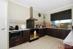  6 Corine Way Bayonet Head WA 6330 $525,000 UNIQUE HOME, GREAT LOCATION - Spacious 4 X 2 bathroom plus study and sep lounge - Large open plan living/dining area w' Chef Kitchen - Outdoor dome patio and aggregate floor - Close to Flinders Park Primary School, and Bayonet Head Shopping Centre  This spacious uniquely designed 2006 brick veneer home located on a quiet street in ever popular Bayonet Head. With side gate access to very private back yard, where you will find a dome patio with aggregate flooring all on a flat 719m2 block. The front of the house has fantastic road appeal with feature columns and an entrance pathway. Upon entering the home you will find the master bedroom to your right with large WIR housing plenty of shelving and hanging space, ensuite with a separate toilet. Off to the left is a separate lounge for those home movie nights the whole family can enjoy then further down the hall is a large study or a 5th bedroom. Follow the hallway through to a very spacious well-appointed open plan kitchen, dining and lounge. The chef's kitchen has a built in pantry feature bench divider and plenty of cupboard space, high ceilings, wood floor look vinyl throughout living and hallways. Dining is exceptionally large currently holding a 10 seater dining table with a reverse cycle air conditioner to heat and cool the dining/lounge area. Off the dining room down a small hallway is the other 3 bedrooms with double mirror sliding door BIR's, main bathroom with shower and bath and a separate room with vanity and floor to ceiling mirror, laundry with separate toilet. Located only a short drive to Flinders Park Primary School, new Bayonet Head shopping centre, local pharmacy and parks this fabulous family home won't last long call Kathleen Mier today on 0439 421 059. 