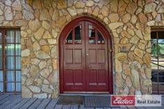  200 Coombes Rd Kronkup WA 6330 $895,000 Stone Manor with Ocean Views in Incredible Lifestyle Destination - 	 Magnificent stone home on five acre lifestyle block  - 	 Spectacular setting on undulating block dotted with beautiful Karri, with views to Tor Bay - 	 Wide wrap-around verandahs, stunning internal timbers & plasterwork - 	 Amazing sun filled country kitchen-dining room with vaulted ceiling - 	 Separate formal lounge and formal dining - 	 Glorious modern lounge/family room with terrific outlook - 	 Large bedrooms downstairs, additional huge master upstairs with spa overlooking ocean - 	 Character family bathroom with claw-foot bath - 	 Large stone-construction double carport, 9m x 8m shed, stone woodshed/stable, and double stable with store room - 	 Bore with potable water, ample rainwater supply  - 	 Amazing lifestyle destination, previous use as B&B It is obvious even before entering, so much love and consideration went into the original design, build and positioning of this gracious country homestead. And it is only fitting that the property and region chosen to create this distinctive home should be just as inspiring and beautiful. The home is set high on picturesque Torbay Hill in a small, friendly coastal community near Albany. It cleverly reflects the elegance and classic craftsmanship of a bygone era. What a glorious place to run a few horses, offer B&B accommodation handy to marvelous scenery and outdoor activities, or just sit in a rocking chair with wine and book in hand and relish the country experience. The sprawling home features a gracious, flexible downstairs floor plan including wide corridors, timber floors and dados, three elegant, light-filled living areas and spacious country kitchen, separate dining room, large bedrooms, vaulted and high ceilings, open fireplace and heritage bathroom with claw foot bath. Upstairs reveals a glorious master bedroom with ensuite spa bath overlooking the ocean. The block itself is absolutely stunning with good pasture dotted with inspiring Karri trees. Perfect for a few stock or just for a bit of space, the property also boasts a great 9m by 8m colourbond shed, separate stables with store room, and stone shed that would also  work as a stable. Property Details Elders Property ID: 9726327 4 bedrooms 2 bathrooms 4 car parks Land Area 2.083 hectares Double garage Double carport 