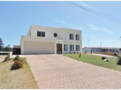  27 Ammon Ave Ledge Point WA 6043 $695,000 Amazing panoramic views of the Indian Ocean from most rooms. This 2 storey home will impress, quality fixtures and fittings, plenty of living space inside and out. Separate access to a large shed with easy access, ideal for a keen fishing family. Level 2 has a large kitchen/dining with a separate living area. Master bedroom has en-suite with ocean views from the spa and walk in robe. Level 1 - 3 bedrooms, bathroom, family room and laundry. There is plenty of storage space throughout the home as well. All of this on a 1013sqm block. Activity - 1 Air conditioned - 1 Balcony - 1 Bathrooms - 2 Bedrooms - 4 Built in Wardrobes - 1 Dishwasher - 1 Garage - 2 Gas HWS - 1 Inside Spa - 1 Kitchen/Dining - 1 Lounge - 1 RCDs/Smoke Alarms - 1 Septic - 1 Storage - 1 Storeys - 2 Water Closets - 2 