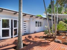  37 Weyba St Sunshine Beach QLD 4567 $895,000  Cool, Calm & Contemporary in Sunshine Built around the sunny deck that is home to a spa, this Bali-inspired property is designed for those who like to rest, relax and make the most of the famous Noosa lifestyle.  From the lush tropical gardens to the thatch roof bungalow in the backyard, you will feel a million miles away as soon as you enter this home.  The family home boasts four bedrooms including the master suite complete with walk-in robe, private ensuite and access to both the fourth bedroom and rumpus/ media room. The main bathroom services all other bedrooms. For the home chef, the contemporary kitchen offers all the modern conveniences needed to make cooking a breeze including the following Bosch appliances: gas cook top dishwasher and oven.There is a Cesar stone breakfast bar for casual dining and ample storage and bench space for functionality. The kitchen overlooks an open-plan living and dining space that features plenty of windows and doors, plus raised ceilings and a neutral colour scheme that all work together to create a light, breezy calming space for the family to gather and enjoy quality time together.  For the adults, sunset cocktails are best enjoyed in the spa, or wander through the tropical gardens to the bungalow where you can make the most of Noosa's beautiful weather.  This home also features a rumpus room that can easily be used as a media room for the kids or as a parent's retreat, and opens out to a covered deck with a beautiful leafy outlook.  This property also features ceiling fans louvers throughout and air conditioning to create a comfortable living space year round.  This tropical hideaway is located just a short stroll from the popular Sunshine Beach surf club, Sunshine Beach village, local schools and public transport, while Noosa Main Beach, Noosa National Park and Noosa Junction are just moments away.  PROPERTY DETAILS $895,000  ID: 362661 