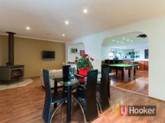  49 Clive St Hampton Park VIC 3976 $380,000+ Loving Family Home Are you looking for a well-kept family home that has all the bells and whistles? Well look no further as we have found you this beautiful three bedroom delight, located in a prime location close to High schools and primary schools, public transport, Hampton Park Shopping complex and freeway entrances.  As you approach the securely fenced home you are led by the well-established gardens to the front door where you will be greeted by the large light filled lounge room which embraces you to feel at home. Continuing through you will then be met with the hostess kitchen with gas appliances and plenty of cupboard space; this overlooks the meals and family area with a gas log fireplace creating a warm and comforting environment. Step down into the sunken rumpus room where you can enjoy a game of pool and entertain friends at the inbuilt wet bar, that comes with a bar fridge, shelving and cupboard space and is nearby the second bathroom.  There are three decent sized bedrooms on offer all of which have built in robes, the master bedroom positioned at the front of the house which has the added benefit of a two way bathroom with a bath. Further comforts of the home are ducted heating, an air conditioner and floating floorboards .  Make your way out to the great outdoors where you will be the life of the party and entertain under the pergola with a timber decking that overlooks the spacious backyard with a garden shed and a double carport as well as extra car space to park three more cars, all this on a 598m2 block (approx).  This perfect home is family living at its finest, as well as entertaining which lends itself to a fulfilling life, full of happiness and fond family memories. We extend an invitation to personally inspect this gracious family home, so make your enquiry today and start your family living!   Property Snapshot  Property Type: House Construction: Brick Veneer House Size: 598.00 m2 Land Area: 598 m2 Features: Billiard Built-In-Robes Close to schools Close to Transport Decking Ducted Heating Ensuite Family Room Fully Fenced Yard Garden Shed Gas Landscaped Gardens Lounge Pergola Rumpus Room Storage Undercover Entertainment Area 