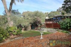  80 Estuary View Road Dawesville WA 6211   Estuary Views - Weekend Getaway Price: $549,000 Comfy 3 bedroom, 2 bathroom brick and tile home situated in a quiet leafy location. This home is only a short drive to the Dawesville Shopping Village and well located to the local boat ramp, Port Bouvard Sport and Recreation Club, The Cut golf course and Pyramids beach.  What a fabulous place to relax in the garden and enjoy the outlook this home offers. FEATURES OF THIS PROPERTY INCLUDE: -3 bedrooms, 2 bathrooms -Roomy lounge with wood fire -Ducted evaporative air conditioning and insulation  -Full length sun room  -Outdoor decked entertaining area  -Reticulated gardens, several garden sheds for storage  -Electric storage hot water system  -Single carport plus extra high gable carport suitable for boat/caravan  -Concrete driveway and extra parking area for vehicles Sewer passes -1088sqm block Get on the walking shoes and head down to the pristine estuary. To inspect please call Jo-Ann Yandle on 0418 944 754 