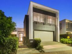  9 Tide Ln Bulimba QLD 4171 $1,300,000 The Ultimate Entertainer Could soon be yours! The owners have moved to the coast. Grab the opportunity to buy into this premium Bulimba location.  Stunningly renovated with no expenses spared. Elegant and super contemporary, you can expect to instantly fall in love with this beautiful home. Just a short stroll to the Brisbane River, Oxford Street complete with its own direct access to a family friendly park, this home is a must view.  This dual level residence features clean, sleek lines, natural stone floors and a stunning indoor outdoor entertaining area with floor to ceiling bi folding doors. Your living spaces seamlessly merge with the private tropical outdoor entertaining area. Inside, the wonderful entertainers kitchen features quality stone benchtops, integrated cabinetry, Gaggenau appliances, walk in pantry and room for two fridges. Bright, expansive living areas provide room for the family to enjoy their own space whilst remaining connected to the family hub. Spread over two spacious levels, the lower level is dedicated to living whilst the upper level hosts four large bedrooms and two large bathrooms.  - Waterline riverside precinct - Expansive open plan living - Architectural floor to ceiling bi fold doors (with electric blinds) - Entertainer's kitchen with Gaggenau appliances and stone benchtops - Four large bedrooms including master with luxurious ensuite - 2.5 bathrooms - featuring large Italian ceramic tiling, and European fittings - Ducted air conditioning - 9 foot square set ceilings - Spacious double garage Bulimba is less than 5 km to the CBD and is close to many of the city's educational institutions, transport networks, local parks and sporting clubs. Children are well catered for with lovely playing parks nearby. Take the 400m stroll down the Riverwalk to Bulimba's Oxford Street with its fabulous restaurants, bars, cafes, delis, and boutiques. Convenient public transport including the wonderful ferry and CityCat terminals extremely close by as well as numerous bus stops.  Please call Chris for further details!   Property Snapshot  Property Type: House Land Area: 342 m2 Features: Ensuite Air Conditioning Remote Garage Deck Fully Fenced Dishwasher 