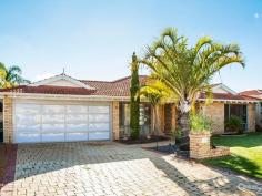  85 Bacchante Cir Ocean Reef WA 6027 $825,000 - $855,000 LIVE THE BEACH LIFESTYLE Inspection Times: Sun 26/06/2016 02:00 PM to 02:30 PM If you want a beautifully renovated property, then this one will tick the boxes. Situated on a spacious 781sqm block, only a short walk to the beach and coastal pathways, this home offers a combination of perfect location, great street appeal and an interior that is finished to a high quality and standard. This fantastic 4 bedroom, 2 bathroom open plan home has it all.  Features include, but are not limited to:  Inside  -Double front door entry to foyer  -Front lounge room features a built in bar, great to entertain family and friends  -Light and bright master bedroom situated to the front of the home with WIR and modern en suite  -Spacious and beautifully updated kitchen with stone bench top, heaps of storage space, S/S appliances and feature lighting  -Shopper's entry  -Open plan meals, kitchen, lounge and games area  -3 minor bedrooms are all good sized with BIR's  -Modern main bathroom and laundry  -Quality light fittings  -New windows throughout  -Lovely porcelain tiling through the main living areas  -Air conditioning  Outside  -Large pitched pergola, perfect for alfresco entertaining all year-round  -Solar heated, below ground lagoon style pool  -Established, easy care, reticulated garden  -Powered shed/workshop  -New automatic garage door  -Drive through access  PROPERTY DETAILS $825,000 - $855,000 ID: 372300 Land Area: 781 m² 