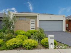  4 Mazel Drive Tarneit VIC 3029 $385,000 to $405,000 Contemporary family home LJ Hooker Point Cook presents 4 Mazel Drive, Tarneit. Constructed with contemporary comfort in mind this four year old (approx) single storey residence will suit both first home buyers and investors that are seeking a low maintenance property near established amenities including a short walk to childcare, Tarneit Gardens shopping centre and new Tarneit train station. Brilliant open-plan living consists of three generously sized bedrooms, hostess kitchen, formal and informal living areas and double garage create an enviable contemporary family living environment in a well advantaged location. Inspect at the open for inspection this Saturday or contact the agent for a private inspection or more information.  - Featuring three bedrooms including the main bedroom appointed with walk in robe and en suite. The remaining bedrooms are generous in size and complemented by built in robes and have shared access to the central bathroom.  - The expansive kitchen exudes distinction with its stainless appliances including under bench oven, range hood, gas cooktop, dishwasher, stone bench tops, ample storage solutions and bench space and pantry.  - Elegant open plan living space that includes central living hub comprising of meals and family area adjacent kitchen. - Sliding doors lead out to the generous rear yard complete with low maintenance established gardens.  - Complete with luxury features including remote control double garage with internal access, ducted heating and evaporative cooling, down lights, separate laundry, landscaped gardens, and more. Located about 29km from Melbourne's CBD, Tarneit has everything at its doorstep from location amenities such as Tarneit Gardens Shopping Centre, Tarneit P-9 College, Tarneit Senior College, Tarneit Cricket Club, kindergarten, and new Tarneit train station, and great access to Princess Freeway. Note. All stated dimensions are approximate only. Particulars given are for general information only and do not constitute any representation on the part of the vendor or agent.   Property Snapshot  Property Type: Single Storey Features: Ensuite 