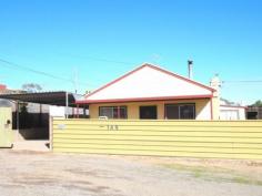  145 Nicholls St Broken Hill NSW 2880 $95,000 Large Shed & Carport Definitely one for the first home buyer or someone who wants good shedding and under cover carport space. This home can also come with most furniture and handy items, come have a look. Inside offers 2 bedrooms, tidy kitchen and a spacious open plan living and dining room with air cooling and wood heating. The external bathroom/laundry is accessed through the enclosed paved courtyard. Located on a corner block with good fencing, 20 x 40ft shed, storage shed and carport that would fit approximately 5 cars.   Property Snapshot  Property Type: House Construction: Cladding Land Area: 656 m2 Features: Alarms - Smoke Alarms Carport Corner Allotment Heating - Combustion HWS - Electric Parking - Off Street Shed - Concrete Floors Toilet - Located In Bathroom Verandah - at Front Yard - Divided Yard - Fenced 