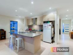  27 Flinders Park Dr Officer VIC 3809 $460,000 Move Up to This Address! Located in the extremely popular Arena estate in Officer, nearby to all amenities, shopping, transport, schools and the M1 Freeway which offers easy access to the Melbourne CBD is this neat, complete and stylish family home!  Oozing street appeal with a modern facade, a wide portico creates an impressive entrance and lasting first impression!  A lounge at the front of the home offers a separate living/TV area, while at the heart of the home is an open plan kitchen, dining and living hub catering for family friendly everyday living needs. Accommodation includes four bedrooms, the master with ensuite and WIR, while the remaining bedrooms have built in robes and are serviced by the main bathroom. Also included is a double garage with remote and direct internal access into the home as well as a rear roller door to the backyard. There is ducted heating and ducted refrigerated cooling throughout for year round comfort. The 400m2 (approx.) allotment offers a low maintenance lifestyle and incorporates an undercover alfresco entertaining area for all year use and enjoyment. This top location offers the lifestyle your family deserves, do not delay! Please note: All property details listed were current at the time of publishing. Due to extreme buyer demand, some properties may have been sold in the preceding 24 hours. Therefore confirmation of all opens with the listing agent within 24 hours of their scheduled opening is advised.   Property Snapshot  Property Type: House Construction: Brick Veneer Features: Alfresco Close to Transport Dining/Meals Ducted Heating Ensuite Family Room Lounge Remote Control Garaging Undercover Entertainment Area 