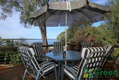  80 Estuary View Road Dawesville WA 6211   Estuary Views - Weekend Getaway Price: $549,000 Comfy 3 bedroom, 2 bathroom brick and tile home situated in a quiet leafy location. This home is only a short drive to the Dawesville Shopping Village and well located to the local boat ramp, Port Bouvard Sport and Recreation Club, The Cut golf course and Pyramids beach.  What a fabulous place to relax in the garden and enjoy the outlook this home offers. FEATURES OF THIS PROPERTY INCLUDE: -3 bedrooms, 2 bathrooms -Roomy lounge with wood fire -Ducted evaporative air conditioning and insulation  -Full length sun room  -Outdoor decked entertaining area  -Reticulated gardens, several garden sheds for storage  -Electric storage hot water system  -Single carport plus extra high gable carport suitable for boat/caravan  -Concrete driveway and extra parking area for vehicles Sewer passes -1088sqm block Get on the walking shoes and head down to the pristine estuary. To inspect please call Jo-Ann Yandle on 0418 944 754 