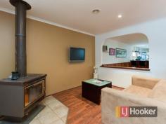  49 Clive St Hampton Park VIC 3976 $380,000+ Loving Family Home Are you looking for a well-kept family home that has all the bells and whistles? Well look no further as we have found you this beautiful three bedroom delight, located in a prime location close to High schools and primary schools, public transport, Hampton Park Shopping complex and freeway entrances.  As you approach the securely fenced home you are led by the well-established gardens to the front door where you will be greeted by the large light filled lounge room which embraces you to feel at home. Continuing through you will then be met with the hostess kitchen with gas appliances and plenty of cupboard space; this overlooks the meals and family area with a gas log fireplace creating a warm and comforting environment. Step down into the sunken rumpus room where you can enjoy a game of pool and entertain friends at the inbuilt wet bar, that comes with a bar fridge, shelving and cupboard space and is nearby the second bathroom.  There are three decent sized bedrooms on offer all of which have built in robes, the master bedroom positioned at the front of the house which has the added benefit of a two way bathroom with a bath. Further comforts of the home are ducted heating, an air conditioner and floating floorboards .  Make your way out to the great outdoors where you will be the life of the party and entertain under the pergola with a timber decking that overlooks the spacious backyard with a garden shed and a double carport as well as extra car space to park three more cars, all this on a 598m2 block (approx).  This perfect home is family living at its finest, as well as entertaining which lends itself to a fulfilling life, full of happiness and fond family memories. We extend an invitation to personally inspect this gracious family home, so make your enquiry today and start your family living!   Property Snapshot  Property Type: House Construction: Brick Veneer House Size: 598.00 m2 Land Area: 598 m2 Features: Billiard Built-In-Robes Close to schools Close to Transport Decking Ducted Heating Ensuite Family Room Fully Fenced Yard Garden Shed Gas Landscaped Gardens Lounge Pergola Rumpus Room Storage Undercover Entertainment Area 