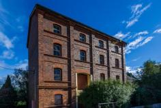 10 Union St Longford TAS 7301 $400,000 Imposing Proportions - Industrial History A blank canvas waiting for a creative mind! This imposing 4 storey (c. 1897) building was purpose built as a 'roller oat' mill and was a working building until decommissioned 30 years ago. Retains stunning original character with huge exposed Oregon beams, timber floors, celery pine windows and even some of the original vintage machinery. Zoning is Light Industrial with residential use discretionary (top floor has basic 1 bedroom living quarters).The building lends itself to being redeveloped for many uses (STCA) and oozes character, space and light - think grand design project; working studio; funky residence with commercial component; artist retreat; boutique manufacture (whisky distillery?) etc. General Features Property Type: House Bedrooms: 1 Bathrooms: 1 