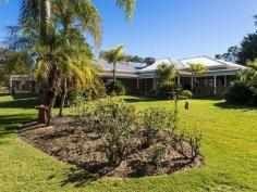  123 Millhouse Rd Belhus WA 6069 “DIVERSITY AT IT’S BEST” Very rarely do you find a beautiful property that has it all, and perfectly located for the astute investor to choose their options. Boasting 5 acres with 2 TITLES, currently set up as a successful Alpaca Enterprise, however the world is your oyster as to what your plans maybe! Located only approximately 4 k’s from the Ellenbrook shopping precinct and best if all is that it’s a 2 minute drive to enjoy the Vines Resort and all the amenities that it has to offer! AND of course being apart of the “Swan Valley” ambience lends itself to convenience to the local wineries, restaurants and unique galleries. FEATURES INCLUDE: • 	 Spacious colonial style home with 298 sqm of living  • 	 Main bedroom boasts a parent retreat WIR and ensuite • 	 Open plan kitchen/dining and family room • 	 Inviting entrance which flows thru to Formal lounge/dining • 	 Generous size games room with bar and stunning views across the valley • 	 Queen size 2,3,& 4 bedrooms with BIR and their own 2nd bathroom • 	 Office or 5th Bedroom • 	 Evaporative A/C throughout the house • 	 Reverse cycle A/C in the kitchen and family room • 	 Bull nosed verandah’s and a 2 car carport gives you convenience from the weather • 	 A separate 12 x 8m brick and iron shed/workshop with toilet • 	 Easy care reticulated gardens and lawns serviced from the bore, whilst the house has both scheme and rain water • 	 Sensational views across the valley and the meandering “Ellen Brook” at the back of the property • 	 Electric remote security front gates • 	 Excellent pasture for any chosen stock with good fencing and water to each paddock This is just a hint of what this property has to offer, an inspection will impress so call Kris anytime for an appointment to view. 4 bedrooms 2 bathrooms 2 car parks Land Area 5 acres Double garage 
