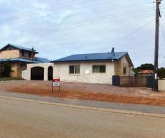  15 Canning Blvd Hopetoun WA 6348 $275,000 Renovated Home - Great Location Tidy three bedroom home on a 1012sqm block, with rear lane access. Situated in a great and sought after location on Canning Blvd, close to all amenities including the school, shops, restaurants, and just a short walk to beautiful West Beach. The house, constructed from brick and Ravey sandstone, has recently undergone a full renovation including a new colour bond roof and new wiring throughout, right down to the light fittings and window treatments. The new modern kitchen has been tastefully done - all new benches, huge big gas oven/hotplates and loads of cupboard space. There's a brand new luxury bathroom with added comforts such as heat lights and a big shower head. Flooring throughout is new with modern floating wood floors in living area/kitchen and plush carpets in the bedrooms. Two of the three bedrooms have built in robes with good storage options. Outside there is room for all - the big carport would easily fit several vehicles or could function as an outdoor living space - its fully bricked in and covered with access to the front yard, back yard and inside. Out the back there's another alfresco entertaining area. Then there's the patio and the big grassed area to soak up the sun... PLUS there's a massive shed with several areas, upstairs mezzanine, power, a second toilet and shower and direct access from the rear laneway. There'e loads of space and loads of options. Other features include: rainwater (Plumbed internally), reticulation, insulation, new timber trusses, phone connection point, digital TV All the hard work has been done here and there's minimal upkeep to maintain. Organise an inspection today. 3 bedrooms 1 bathrooms Land Area 1012 square metres 