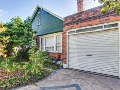  107 High St East Launceston TAS 7250 $520,000 "Caradi" on High Street - Self Contained Unit Below Built in 1930 and never before been offered for sale.  "Caradi" is located in the always popular High Street within a short distance to schools, parks and the city.  The home can be utilised in a number of ways. Upstairs is a grand 3 bedroom home with original timbers, picture rails, lead lighting and bay windows with lovely views over East Launceston and the mountains. Below is a separate self contained 9 square 2 bedroom unit which was previously rented out at $245 per week.  Single garage for parking and low maintenance gardens. General Features Property Type: House Bedrooms: 5 Bathrooms: 2 