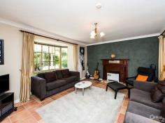  11 Torcross St Warnbro WA 6169 $399,000 PRETTY AS A PICTURE This attractive property is nestled on a 725m2 block, overlooking parkland in the heart of Warnbro, with easy access to transport, Schools, shops & beach.  Accommodating the entire family, the home comprises 4 Bedrooms, 2 Bathrooms, lounge, kitchen, dining and a sunken games room accessing the pretty patio.  With extensive tiling throughout the living area and a beautiful, spacious jarrah kitchen as the central hub, the home also boasts many attractive features such as the gorgeous fireplace surround to the front lounge.  The huge master bedroom is located to the rear of the home, complete with WIR and ensuite.  All bedrooms are carpeted and have ceiling fans for individual comfort.  Outside and running the full length of the property is a fantastic entertainment area, which will provide endless possibilities for fun. There is also a separate tiered rear garden and good-sized workshop/shed, which could be easily accessed via the drive through carport.  Other features include;  - 	 Reverse cycle split system air-con  - 	 Solar HWS  - 	 Auto Bore Retic  PROPERTY DETAILS Offers Over $399,000 ID: 365306 Land Area: 725 m² Building Area: 184 