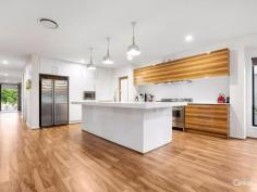  186 Balgownie Dr Peregian Springs QLD 4573 1,150,000 It does not come any better than this........ Sunshine Coast living doesn't get any better than this.  Set on a 788sq m north-facing block with views of the fifth fairway, this near-new Peregian Springs home is simply stunning.  Located close to local shops, schools, public transport and, of course, the golf course and club house, this home is in the heart of the luxurious Peregian Springs suburb.  Living is spread over two levels with plenty of room for the whole family plus guests in this four bedroom, two bathroom home.  The cleverly designed floor plan includes multiple living spaces to cater for a large family or for those who like to welcome guests.  The lower-level of the home features a separate media room and open-plan dining and lounge space that opens out to a covered entertaining deck, while a large living space is also located on the upper-level of the residence.  The modern kitchen overlooks the main living space and is sure to impress the home chef with features such as a double oven, gas cooktop, barbecue plate, beautiful cabinetry, butler's pantry, stone bench tops, dishwasher and built-in microwave.  When it comes to sleeping accommodation, there is ample space for everyone with three generous-sized bedrooms with walk-in robes all located on the upper-level of the residence, along with the main bathroom that features a double shower.  For those who prefer single-level living, the gorgeous master suite is located on the ground level and features a spacious ensuite complete with double shower, plus a walk-in robe.  Boasting low-maintenance gardens and a sparkling 13m easy-care, saltwater pool, the new owners can simply move in and make the most of their new enviable lifestyle.  There is also side access for a boat or caravan, room for a golf buggy and a garden shed accessible through the double garage, for those who love to garden.  This property also features tinted glass on the rear windows overlooking the golf course and the front door, a study under the stairwell, timber flooring throughout the lower-level of the home, ducted air-conditioning and vacuum system, and fans throughout.  PROPERTY DETAILS 1,150,000 ID: 356287 