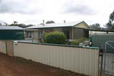  96 Lock St Narrogin WA 6312 $126,000 Home on a corner block with plenty of outdoor storage Situated on a corner block with front and side access to the property, this home is great value! Park 2 cars under the double carport and then park the caravan near the house. Forget about not having enough space to store your tools or the things you just don’t want to part with, this easy care block has various small sheds, a workshop and an open sheltered work area. When you have finished preparing your caravan for the next holiday, working (or playing) in the workshop or just enjoying the semi rural view, walk into the house to the comfort of the wood heater. If that is not enough, turn on the reverse cycle airconditioner and relax. Call Sandra 0487316906 Property Details Elders Property ID: 9950594 2 bedrooms 1 bathrooms 4 car parks Car Parks: 2 Double carport Air Conditioning 