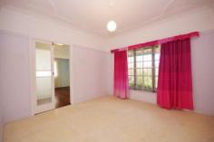  45 Lamington Terrace Nambour QLD 4560 $329,000 ELEVATED WITH MAGIFICENT VIEWS SUPERB PRESENTATION BIG YARD POLISHED FLOORS INTERNAL STAIRS TO LARGE BASEMENT Watch the sun rise from your own elevated deck! With magnificent rural and mountainous views over town towards the coast. This solidly constructed and spacious home has been beautifully presented. Upstairs with 3 generous bedrooms, neat roomy kitchen, polished hardwood floors and separated dining space opening to timber deck. Internal stairs connect to the huge storage basement which has been utilised for extra living space with amenties. 2 separate carports including remote lockup with easy access to front door. Wonderful established gardens and superb front enclosed entry porch with picturesque surrounds. Large 800m2+ block with big fenced back yard. An easy walk to shops, schools and transport. Property Details Elders Property ID: 9782117 3 bedrooms 1 bathrooms 2 car parks Land Area 809 square metres Double carport 