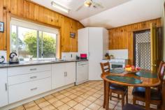  2910 W Tamar Hwy Loira TAS 7275 $219,000 - $259,000 A lifetime of memories The current owners have lived here a lifetime and have enjoyed ever changing family life in their home. It is surrounded by farmland and set on a productive 2967m2 plot with raised vegie beds and a few fruit trees too. A double garage, (with power) boat shed, carport and a couple of garden sheds mean there is ample space for all of the boys toys and your bits and pieces. The home offers a flexible floor plan with an independent living set up for the grandparents or teens combining a bedroom, kitchenette and lounge plus access to the two way bathroom and laundry. An upgraded kitchen with dishwasher, good pantry and storage space is light and airy and flows directly to the lounge which is heated by a cozy wood fire. A rumpus room at the furthest end of the home gives you space to entertain or a place for the kids to hang out. An enclosed verandah/sunroom provides yet another space to sit and enjoy some quiet time with family and friends. 2 double bedrooms, both with built ins and a 3rd single bedroom/study plus the addition of the unit mean you can fit the whole family in or those last minute guests. With great extras like NBN connection, town water and around 5 minutes to local shops, schools and amenities and no nearby neighbours plus scope to add your own touches to make it yours, this affordable family home could be the option that you have been searching for! General Features Property Type: House Bedrooms: 4 Bathrooms: 1 