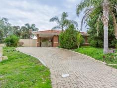  24 Feilman Dr Leda WA 6170 $329,000 WALK TO SCHOOL AND SHOPS This is an Excellent Opportunity to leave your car at home as this 4x2 family home is only a short walk to the Local Primary School and Shops. Entry takes you into the Separate Lounge room with wood look flooring, this room has a Foxtel Point and front Roller Shutters. The Master Bedroom also has a front roller shutter and is just off the Main Entry and this accommodates a queen size bedroom suite with ease. There is a walk in robe in the Master Bedroom. With ducted air con throughout the home- summer will never be a problem!! The Open Plan Kitchen/Meals and Family room is spacious and has beautiful wood flooring. A sliding door takes you out to the huge Patio Entertainment area. Situated on a 684sqm Block with extensive paving, grassed areas and loads of parking this home is ready for a family to walk right in and enjoy the lifestyle. FEATURES: Four Bedrooms Two Bathrooms Separate Lounge Room Open Plan Living Skirting Boards Kitchen with Gas cooker Electric Oven Range hood Pantry Ducted Air Con Gas Storage Hot Water Security Doors/Windows Roller shutters  Pet Door Patio Carport Garden Shed 684sqm Built 1993 Land Rates $1,579.00 Water Rates $763.56 Property Details Elders Property ID: 9985631 4 bedrooms 2 bathrooms 2 car parks Land Area 684 square metres Double carport 
