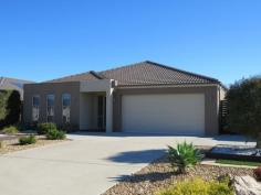  17 The Grange Paynesville VIC 3880 $433,000 FIRST CLASS IN GREAT LOCATION Immaculate and ready to move in, this beautifully presented home comprises four bedrooms, (master with ensuite and WIR) bathroom, spacious open plan living/kitchen/meals area which opens onto a large undercover alfresco area. Recessed ceiling in entry with internal access to double garage with auto door. Large activity room for entertaining with bathroom and sauna, also suitable for extended family. Other inclusions - LED Lighting, ducted gas heating, split system, security system, dishwasher, power grid to reduce your power bills and low maintenance pebble gardens. Vehicle access into side yard for boat storage. Overlooks reserve and quality homes which surround.   Property Snapshot  Property Type: House Aspect Views: First class home in quality location Construction: Kool Wall - Rendered Land Area: 595 m2 Features: Built-In-Robes Close to schools Dishwasher Ducted Heating Ensuite Gas Outdoor Living Power Grid Second Toilet Security System Separate Toilet Solar HWS with gas back up Undercover Entertainment Area Walk In Robe 