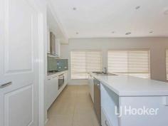  67 Beachview Parade Sanctuary Lakes VIC 3030 $530,000 to $540,000 Resort-style retreat LJ Hooker Point Cook presents 67 Beachview Parade, Sanctuary Lakes. This superb modern home is a true balance of style and comfort; perfect for a growing family! Comprising four spacious bedrooms, this home is impressive both inside and out with an open-plan kitchen, two separate living zones and low maintenance landscaped gardens. This beautiful residence is near shops, parks and schools and enjoys access to the fabulous resort facilities and 24 hour security. Inspect at the open for inspection this Saturday or contact the agent for a private inspection or more information.  - Calling all investors with secure lease in place until 30/12/2016 at $400 per week (approx).  - Boasting four bedrooms, including the main bedroom with double built in robes and en suite. Bedrooms two, three and four are each fitted with built in robes.  - Contemporary kitchen with stainless steel cooking appliances including 900mm under bench oven, gas cook top and range hood, dishwasher, stone bench tops, glass splash back, microwave niche, pantry and island bench perfect for causal meals.  - Exceptionally designed open plan living combining living and meals area adjacent the kitchen plus separate formal lounge upon entry.  - Sliding doors from the living area lead out to the spacious backyard set on a 513m2 block (approx).  - Complete with luxury features including double garage with internal access, ducted heating and cooling, alarm system, down lights, separate laundry, linen cupboard, landscaped gardens and more. Located about 22 km from Melbourne's CBD in Sanctuary Lakes, you will enjoy resort facilities including gym, swimming pool and tennis courts, waterfront Village Centre with shopping and dining options, 24 hour estate security monitoring and nearby open areas with walking tracks and wetlands. Plus there's the added benefit of an optional membership to the golf course. Note. All stated dimensions are approximate only. Particulars given are for general information only and do not constitute any representation on the part of the vendor or agent.   Property Snapshot  Property Type: Single Storey Land Area: 513 m2 Features: Ensuite 