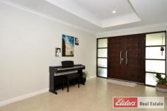  39 Katoomba St Orana WA 6330 $395,000 Supreme Quality and Style with Affordable Price Tag - 	 Spacious, distinctively designed contemporary home - 	 Quality built by Zac Caramia in 2008, double brick, immaculately maintained - 	 Feature double door entry through landscaped gardens and stylish deck - 	 Extremely spacious open plan living with high ceilings - 	 Gorgeous hand-crafted kitchen with heaps of space - 	 King-plus master with deluxe ensuite, walk in robe, and adjoining study/nursery - 	 Two additional large bedrooms, queen and queen/king - 	 Alfresco area with café blinds - 	 Well-established, secure low-maintenance back yard ideal for lock-and-leave or families - 	 Oversize double garage with store room and drive-through access to backyard - 	 Underfloor heating, RC-AC, solar array on 40c rebate scheme For families, new home buyers and investors, this as-new superior property presents a leading opportunity in an affordable suburb convenient to education facilities, shops and Albany’s cinema complex and city centre. Likewise it presents an excellent quality three bedroom floorplan and consummate quality sure to appeal to retirees or nomads looking for that supreme option that can be locked and left. The in-vogue home presents beautifully and stands on a slightly elevated north-facing lot with grape vines, veggie garden, chicken run and delightful street appeal.  While the home is all about living together in a relaxed environment, it also offers energy efficient benefits and a touch of glam. The spacious kitchen has a ritzy splashback and gloss benchtops, and the formal dining area reveals a half divider wall with high and wide two-sided gloss benchtops. Enjoy casual dining during the day and transform the bench space into a dining room bar for evening entertaining. The master suites is also a little ritzy with its spaciousness, twin vanity and shower ensuite, concealed toilet and ample storage. One of the owners of this property is a sought-after local tiler and it shows in the superior choices and finishes throughout. For your private inspection or more information please contact Blair Scott on 0459 024 026. Other features: Built-In Wardrobes,Close to Schools,Garden,Secure Parking,Terrace/Balcony,Games room Elders Property ID: 7364783 3 bedrooms 2 bathrooms 2 car parks Land Area 729 square metres Double garage Air Conditioning 
