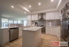  28 Comet Corner McKail WA 6330 $500,000 A Bigger, Better Family Life - 	 Extra-large, high quality home on large lot - 	 King size master with walk-in robe and great ensuite - 	 Two additional king/queen bedrooms and one queen, all with BIR - 	 Beautiful kitchen with coffered ceiling featuring Miele dishwasher, 900mm stove, walk-in pantry, appliance cupboard, and ample drawers - 	 North-facing open-plan living/dining flowing to covered outdoor entertaining area - 	 Separate theatre room plus large games room - 	 Family bathroom with bath, shower, and separate powder room - 	 Above ground pool, deluxe cubby, built-in trampoline - 	 Double garage, drive-through to large paved area ideal for parking or kids play - 	 Great family parks and new shopping centre nearby - 	 Superb extra-big family home or investment – below replacement cost Boredom won’t come into the equation for the family fortunate enough to acquire this high standard, super spacious property near parks and cycleways. There is so much to keep the kids amused outside on the fine days and plenty of indoor options for those dreary wet weather days. If you crave space, love entertaining and cherish your family and alone time, this property has your lifestyle covered. The superbly-built and designed home reveals quality finishes, fittings and fixtures throughout and an abundance of space and light from the open living area with high spec kitchen to the separate home theatre, games or general activity room, master and family bedrooms, trendy wet areas and under eaves deck. Everything about this property is family oriented, with the deck offering a clear view of the fenced above ground swimming pool and the trampoline set at ground level for added safety.  For your private inspection or more information please contact Blair Scott on 0459 024 026. Other features: Built-In Wardrobes,Close to Schools,Close to Shops,Garden,Secure Parking,Formal Lounge Elders Property ID: 9812868 4 bedrooms 2 bathrooms 2 car parks Land Area 803 square metres Double garage Air Conditioning 