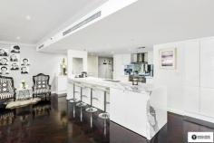  2506/183 Kent Street, Sydney NSW 2000 For Sale - Expressions Of Interest bed 3 bath 4 car 3 A rare offering in the market, this sky home has house-like proportions and is the result of two adjacent apartments amalgamated, seamlessly spanning across 268m2 on a single level. This residence has undergone extensive re-design and renovation throughout with no expense spared. - Luxury items such as motorised blinds, in-built wine fridges, parquetry floors, custom in-built furniture - Advanced CAT 6 cabling/dynalite system with integrated sound system - Calacatta marble kitchen with 900mm oven and cooktop, clever storage and sleek cabinetry - Private master bedroom complete with lavish dressing room and marble ensuite - 2nd bedroom is the size of two bedrooms combined and features its own ensuite, walk-in-robe and terrace - Three covered terraces all create outdoor rooms with captivating views - Expansive views stretch from the city skyline, harbour bridge, Barangaroo Reserve and beyond to the blue mountains Located within the northern Kent Street village, Stamford on Kent is close to transport, cafes, The Rocks, theatres, financial district and easy access to the harbour foreshore. Investors take note - capitalise on the infrastructure change and access to all that Barangaroo has to offer plus the rejuvenation of the Millers Point precinct that is at the door step of Stamford on Kent.  The five star Stamford On Kent features a 24 hour concierge, fully equipped gymnasium, pool, spa and steam rooms and recently renovated common areas. For further information please call Travis Reeve on 0414 347 713 or email travis@vanguarde.com.au.  
