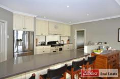  15 Manton Way Willyung WA 6330 The Perfect Property ELDERS EASY AUCTION - SATURDAY 27TH AUGUST AT 11AM - UNLESS SOLD PRIOR • Carefully designed and crafted home in quiet cul-de-sac. • Quality fittings and fixtures to home; double glazed windows & ducted vacuum. • The ‘Queenslander’ styled home offers an unobstructed tree view. • 4 large queen size bedrooms plus large office. • The home provides spacious living areas with french doors on to deck. • Wide verandahs and deck create the perfect setting for entertaining. • Easy access to the home from the large rear garage into house. • 2 Rainwater tanks offering 70,000L capacity run water into house, scheme water available. • 4,379sqm of land, easy vehicle access to shed at rear. • Shed measures 144sqm and includes a large mezzanine for extra storage. • Separate 1 bedroom self-contained accommodation in shed at rear. • Covered parking for 6+ vehicles, plus room for a caravan/boat. If you are looking for the perfect family home with room for everyone inside and out, look no further!  If you are looking for a quality built home with room for the family when they come to stay, a good size shed and room for the caravan, look no further! Very seldom does a property like this become available so soon after construction that it presents like new. This home and property is the result of careful planning and diligent attention to care, it is a true credit to the current owners. Even the most discerning of buyers will find the home an absolute pleasure to visit. Set aside plenty of time to inspect 15 Manton Way because there is a lot to take in, features like; o High quality double glazed windows and doors throughout the entire home. o The home is fully insulated! With insulation under the floor, external and internal walls and 2 layers of insulation to the roof cavity. o A huge main living area with beautiful raking ceilings opens on to the deck and the view beyond. o Quality kitchen with sold surface bench-tops, well designed and carefully crafted cabinetry.  o Premium appliances to kitchen; freestanding Falcon Cooker and noiseless integrated rangehood. o Ducted vacuum system with dustpan extraction unit to kitchen. o Large bathrooms with spa to ensuite and full height tiling. o Timber floors throughout the home. o Queen size bedrooms plus large study/5th bedroom. o 1 bedroom , self-contained flat to shed. Great for guests or teenage retreat. o Low maintenance decking to all verandahs and screening. o Solar panels to shed & Apricus Solar Hot Water Heater with 340L tank. This property is an absolute must see and will go to auction on Saturday 27th August at 11:00am – If not sold prior.  Come to the next open home of contact Brendon Nowotny on 0432 998 035 for a private viewing at any time. Other features: Built-In Wardrobes,Garden,Secure Parking,Polished Timber Floor,Terrace/Balcony, fully insulated Property Details Elders Property ID: 10085147 5 bedrooms 3 bathrooms 4 car parks Land Area 4379 square metres Double garage Double carport Air Conditioning 
