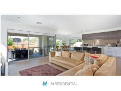  82 Arlington Avenue, South Perth WA 6151 FABULOUS FAMILY HOME Home Open: Sat 6th Aug 2:30pm-3:00pm Style, Quality Value!  Nothing to do in this beautifully appointed 4 bedroom, 2 bathroom plus powder, contemporary home, complete with a bright open plan kitchen, living and dining, opulent master bedroom with his'n'hers ensuite and W.I.R.'s, plus a spacious upstairs sitting room opening out to a private balcony overlooking lush green gardens. The ultimate designer family home at it's finest! The ultra modern kitchen is the central point of this immaculately presented contemporary home, finished with stone bench tops and ample cupboard space for the entertainer. Quality finishes including Caesar Stone bench tops throughout, stainless steel cooking appliances, quality tap ware and galley kitchen with island bench will please the budding Chef of the family. Superior finishes throughout include, easy care Italian Terrazzo tiling, soft drapes, Caesar Stone benches throughout, ducted reverse cycle air conditioning, over height stack-able glass doors, low maintenance established gardens, and much much more! Features: - This idyllic family home offers a community lifestyle nestled among a leafy vista. - Italian Porcelain Terrazzo tile throughout the spacious living area - Modern contemporary kitchen with Ceaser Stone bench tops and stainless steel appliances  - Bright and spacious master bedroom offering lavish ensuite with Ceaser Stone bench top and his'n'her walk-in robes - Three spacious bedrooms located upstairs  - Stylish second bathroom with Ceaser Stone bench tops - Separate powder room - Upstairs teenager's retreat - Ducted reverse cycle air-conditioning 