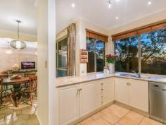  5 Bushland Dr Aberfoyle Park SA 5159 $530,000 - $560,000 The View is just the bonus OPEN INSPECTION SUNDAY 25TH SEPTEMBER 12.00 - 12.30PM Built in the late 90’s, this property was designed to nestle into the block to take full advantage of its elevated position and the far reaching views. While the trees may have grown in the ensuing years, a dappled view remains with some delightful glimpses of the gulf and beyond. Beautifully maintained, the property is ready for its new owner to shift in without having to lift a finger. Four good sized bedrooms are on offer including the main with walk in robe and ensuite. The three remaining bedrooms are complimented with a second bathroom and ducted evaporative cooling is present throughout the home. Living spaces abound in this well thought out floor plan. Be it a formal dining or lounge, or the informal family and meals/kitchen area there is plenty of options for family entertaining needs. Added to this is the rear paved entertaining area offering a commanding vantage point to take in every corner of the rear yard and those panoramic views. Fully landscaped the garden has a manually operated watering system, a rear garden shed and there is a double carport with automatic tilt door with plenty of room for two cars and extra storage. As part of the Woodland Ridge Estate, this property sits amongst similar premium properties with the advantage of easy access to Blackwood, Aberfoyle Park and Flagstaff Hill. It is a pleasure to offer this property for sale on behalf of very realistic vendors. For your chance to inspect or for further information please call me, Mark Burns on 0404151804 or at mburns.blackwood@ljh.com.au   Property Snapshot  Property Type: House Features: Outdoor Entertaining Dishwasher 
