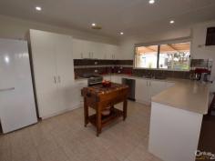  7 Seaview Rd Kingscote SA 5223 $385,000 1/2 AN ACRE ON TOP OF THE HILL! Looking for home on a bigger block with sea views? Tightly held location at the top of the hill, this attractive property boasts sea views north over Shoal Bay and behind over Nepean Bay. Sited on a corner block on a large 2000m2 with subdivision potential (stcc). The home has had all the big ticket areas completely renovated so kitchen, bathroom and laundry. The brand new, high quality "Swagman" kitchen includes a Miele dishwasher and plenty of bench space. Open plan living includes slow combustion fire which warms the whole home. Brand new bathroom with floor to ceiling tiles and seamless shower alcove for easy cleaning. Each bedroom has built in robes along with a linen press in hallway, so there is plenty of storage. Outdoor patio offers a protected place to entertain with enclosed yard safe for kids or pets. Watch the changing seascape from the kitchen window or patio.  Outside there is plenty of room to enjoy, with the boundaries fully fenced, plus the house is separately fenced, along with the front of the block for chooks and an extensive veggie patch. Large double shed with workshop to tinker in. This is what KI life is all about.... Grow your own food and enjoy the lifestyle of spacious, seaside living. Contact Kate Palmer on 0438 531 480 to make a time to inspect. PROPERTY DETAILS $385,000  ID: 375904 Land Area: 2000 m² Zoning: Residential 