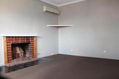  84 Hutt St Northam WA 6401 $169,000 Unbelievable Buy ! This freshly painted, new carpets and window treatments, fibro and tile home is priced to Sell. Its hard to believe that you can be the new owner of all this in a home for $169,000, complete with a white picket fence and workshop/garage.  This three bedroom, one bathroom home needs to be on your list of homes to inspect. You have a lounge area with a split system air conditioner a kitchen/dining room, three bedrooms with a bathroom which includes a bath and shower over the bath. The laundry and separate toilet are located to the rear of the home. To the outside of the property is where you have your covered patio area, another paved uncovered area which will be ideal for summer barbeques. You have a carport to the side of the home for you everyday vehicle and you have a large cement floored, powered workshop/garage with a lean too on the side and a garden shed, so room for all your needs. The price is right with this property. Property Details Elders Property ID: 10432978 3 bedrooms 1 bathrooms 3 car parks Land Area 819 square metres Double garage Single carport Air Conditioning 