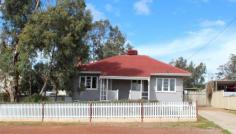  84 Hutt St Northam WA 6401 $169,000 Unbelievable Buy ! This freshly painted, new carpets and window treatments, fibro and tile home is priced to Sell. Its hard to believe that you can be the new owner of all this in a home for $169,000, complete with a white picket fence and workshop/garage.  This three bedroom, one bathroom home needs to be on your list of homes to inspect. You have a lounge area with a split system air conditioner a kitchen/dining room, three bedrooms with a bathroom which includes a bath and shower over the bath. The laundry and separate toilet are located to the rear of the home. To the outside of the property is where you have your covered patio area, another paved uncovered area which will be ideal for summer barbeques. You have a carport to the side of the home for you everyday vehicle and you have a large cement floored, powered workshop/garage with a lean too on the side and a garden shed, so room for all your needs. The price is right with this property. Property Details Elders Property ID: 10432978 3 bedrooms 1 bathrooms 3 car parks Land Area 819 square metres Double garage Single carport Air Conditioning 
