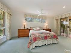 44 Jarrah Rd Buderim QLD 4556 Immaculate Spacious And Elegant Sitting proud on a large 976m² corner allotment is this beautifully presented family home, which offers both charm and style in a picturesque setting with a lovely bush outlook. All astute buyers should inspect.  The home has a great floor plan that flows seamlessly throughout. Upon entry you are greeted by a large formal living/dining area which has a feature low level brick dividing wall. The room is bright and airy with large windows, which allow plenty of natural light into the home.  Adjacent is the functional kitchen which is the hub of the home and would suit the most discerning chef. It has ample cupboard, drawers and bench space, with electric wall oven, separate cook top and dishwasher. It has the added benefit also of a servery window to the outdoor patio, which makes it a breeze when entertaining.  There is a separate family/multipurpose room which is the ideal place to relax and unwind after a long day.  The home has four bedrooms with large built-in wardrobes and ceiling fans. The king size master bedroom is completely separate from the others giving complete privacy. It has a large walk-in wardrobe with its own private en-suite, shower, toilet and single vanity. From here you have access to the beautiful outdoors through double sliding doors.  The outdoor area is an entertainer's delight and boasts an enormous undercover living area which is fully tiled. Here is where you can host the largest of family gatherings, or just sit, relax and enjoy the tranquil views of the garden.  - Four Spacious Bedrooms With Built-in Wardrobes & Ceiling Fans  - 976m² Beautifully Landscaped Level Allotment  - King Size Master Bedroom With Walk-In Robe & Private En-Suite  - Three large Defined Living Areas  - Great Size Kitchen With Ample Cupboard Drawers & Bench Space,  - Electric Wall Oven, Separate Cooktop & Range Hood  - Servery Kitchen Window To Outdoors, Dishwasher & Large Refrigerator Space  - Home Security System & Vacuum Maid  - Separate Laundry, Ample Cupboard & Linen Space Throughout  - Wool Insulation In Ceiling Plus Large Storage Loft Space With Lighting  - Enormous Undercover Fully Tiled Outdoor Living BBQ Area  - Superb Landscaped Feature Gardens & Garden Shed  - Feature Stone Pathways With Large Grassed Enclosed Area  - Water Tank & Enough Room For A Swimming Pool  - Fully Fenced On All Sides  - Larger Than Average Remote Garage With Work Shop Area  - Serene Bush Outlook To Front  - Brick Design With Colourbond Roof  - 10 Minute Drive To Sunshine Coast Beaches  - Short Drive To Both Private & State Schools  - 10 Min Drive To Sunshine Coast Plaza Shopping Centre  - 10 Mins Drive To Buderim Village PROPERTY DETAILS Forthcoming Auction ID: 378497 Land Area: 976 m² Building Area: 285 