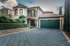  14 Redden Court,  Rostrevor SA 5073 Auction Date: Saturday 5 Nov 10:30 AM (On site) Open Home Dates: Tuesday 25 Oct 12:30 PM - 1:00 PM Tuesday 25 Oct 5:30 PM - 6:00 PM This is the one you've been waiting for ... with beautiful street appeal showcasing reproduction character of days gone by, this big comfortable family home superbly combines charm and personality with modern day luxury in an exclusive location surrounded by equally impressive homes. This immaculately presented one owner home is perfect for the buyer wanting the indoor space without the outdoor burden of a massive block, set on a manageable 542sqm amongst glorious gardens and extensive outdoor entertaining spaces. Desirable interiors ... downstairs - inviting entry hall with under stair storage room - warm and cosy formal sitting room with gas fire place connected to the formal dining room ideal to host dinner parties and Christmas lunch! - stunning solid Blackwood timber kitchen enjoying a corner pantry, wall oven, gas cook top and dishwasher of course  - adjacent open plan family room and casual meals well connected to the rear patio - powder room and laundry with storage cupboards - double auto garage with secure internal entry, drive thru door (handy for extra parking) and there's even a washing line in the garage so you won't need a dryer! ... upstairs - huge master suite with walk in robe and ensuite bathroom - 3 additional double bedrooms, 2 with built in robes - living space for upstairs fun - family bathroom with corner spa and separate shower - balcony to enjoy tree top views and refreshing gully breezes with a glass of wine or two - linen cupboard The great outdoors ... - classic federation facade with feature bluestone and lead light entry - stunning Tessellated entry porch - paved pergola with ceiling fan for any weather outdoor entertaining - lush low maintenance gardens and lawns, a riot of seasonal colour and fully irrigated so you can set and forget - garden/tool shed - relaxing water feature to enhance the tranquil location with resident koalas and abundant birdlife  